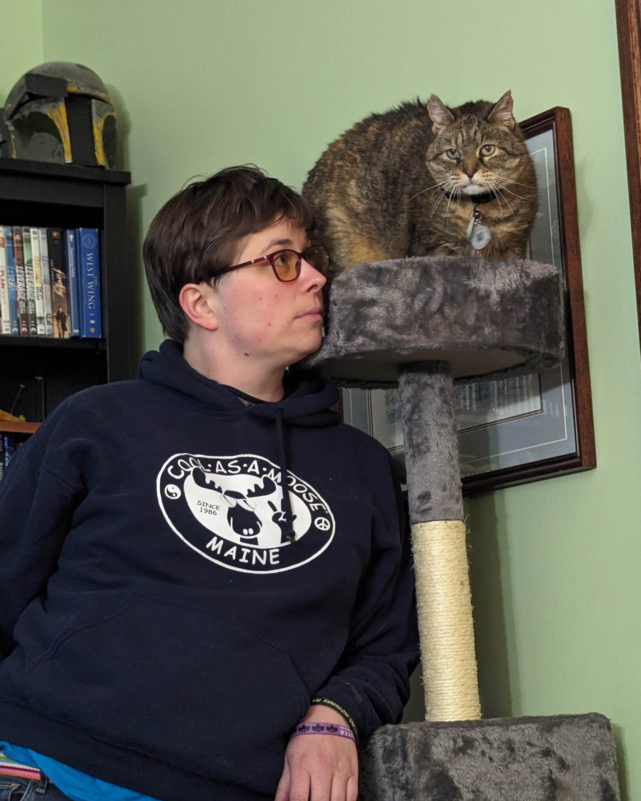 Casey Casey posing with her cat.