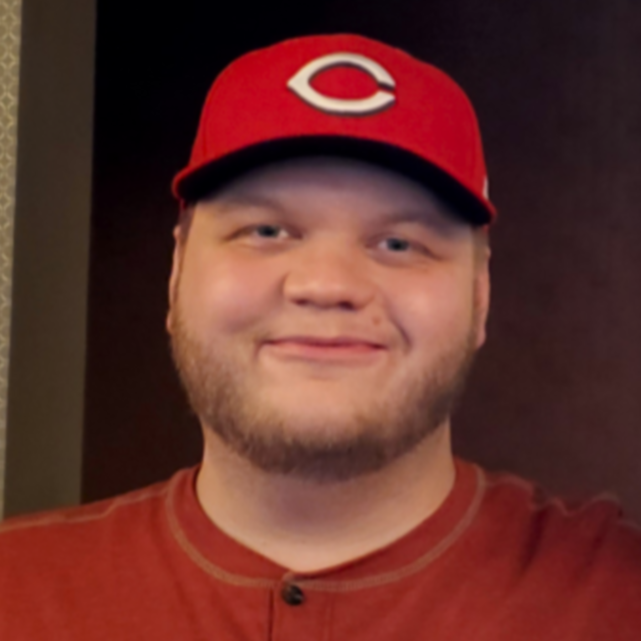 Joe Joseph wearing a red Chicago Bears hat.